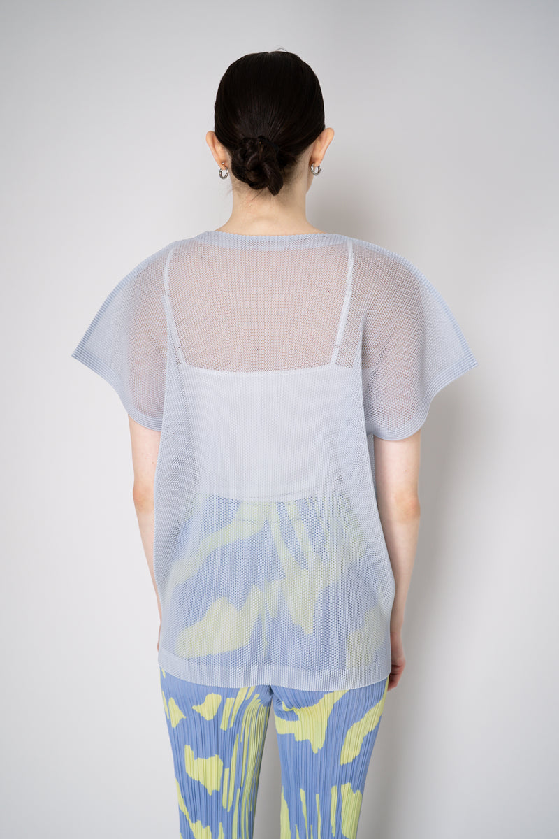 Pleats Please Issey Miyake Tatami April V-Neck Mesh Shirt in Pale Blue Vancouver. Shop Online or in Store.