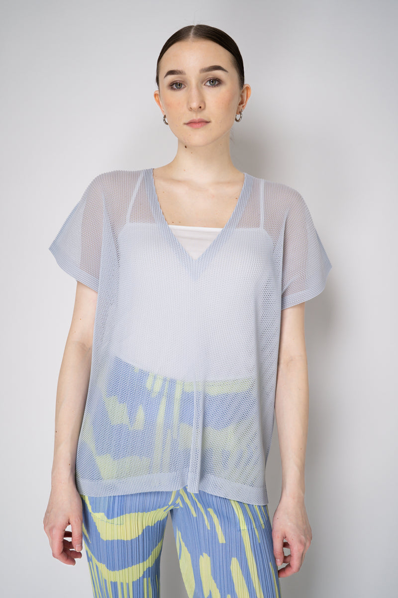 Pleats Please Issey Miyake Tatami April V-Neck Mesh Shirt in Pale Blue Vancouver. Shop Online or in Store.