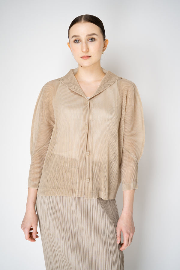 Pleats Please Issey Miyake Tatami July High Neck Mesh Cardigan in Buttercream Beige Vancouver. Shop Online or in Store