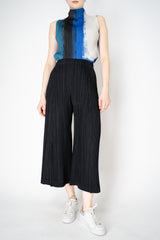 Pleats Please Issey Miyake Thicker Bottoms 1 Wide Flared Pleated Trousers in Black Vancouver. Shop Online or in Store