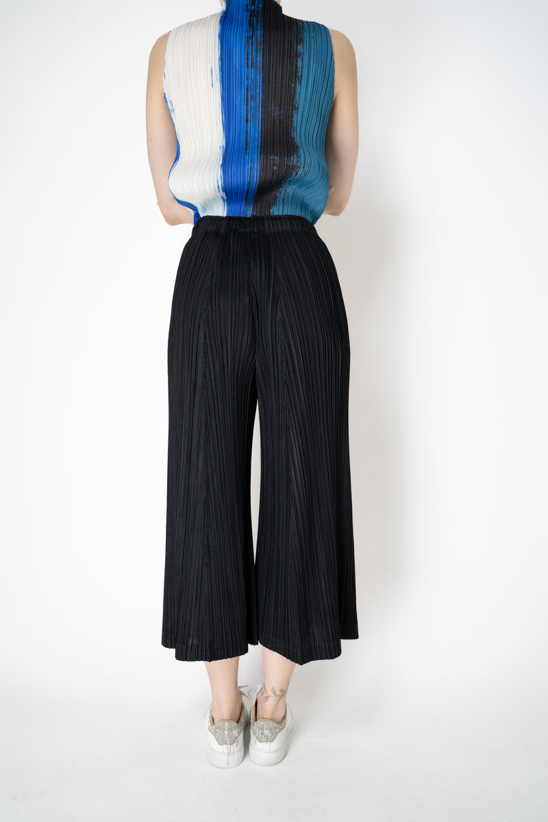 Pleats Please Issey Miyake Thicker Bottoms 1 Wide Flared Pleated Trousers in Black Vancouver. Shop Online or in Store
