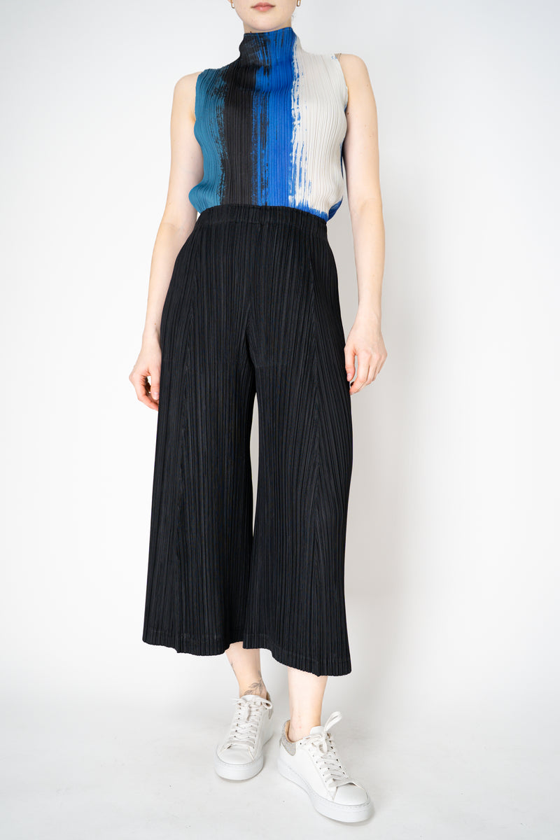 Pleats Please Issey Miyake Thicker Bottoms 1 Wide Flared Pleated Trousers in Black Vancouver. Shop Online or in Store