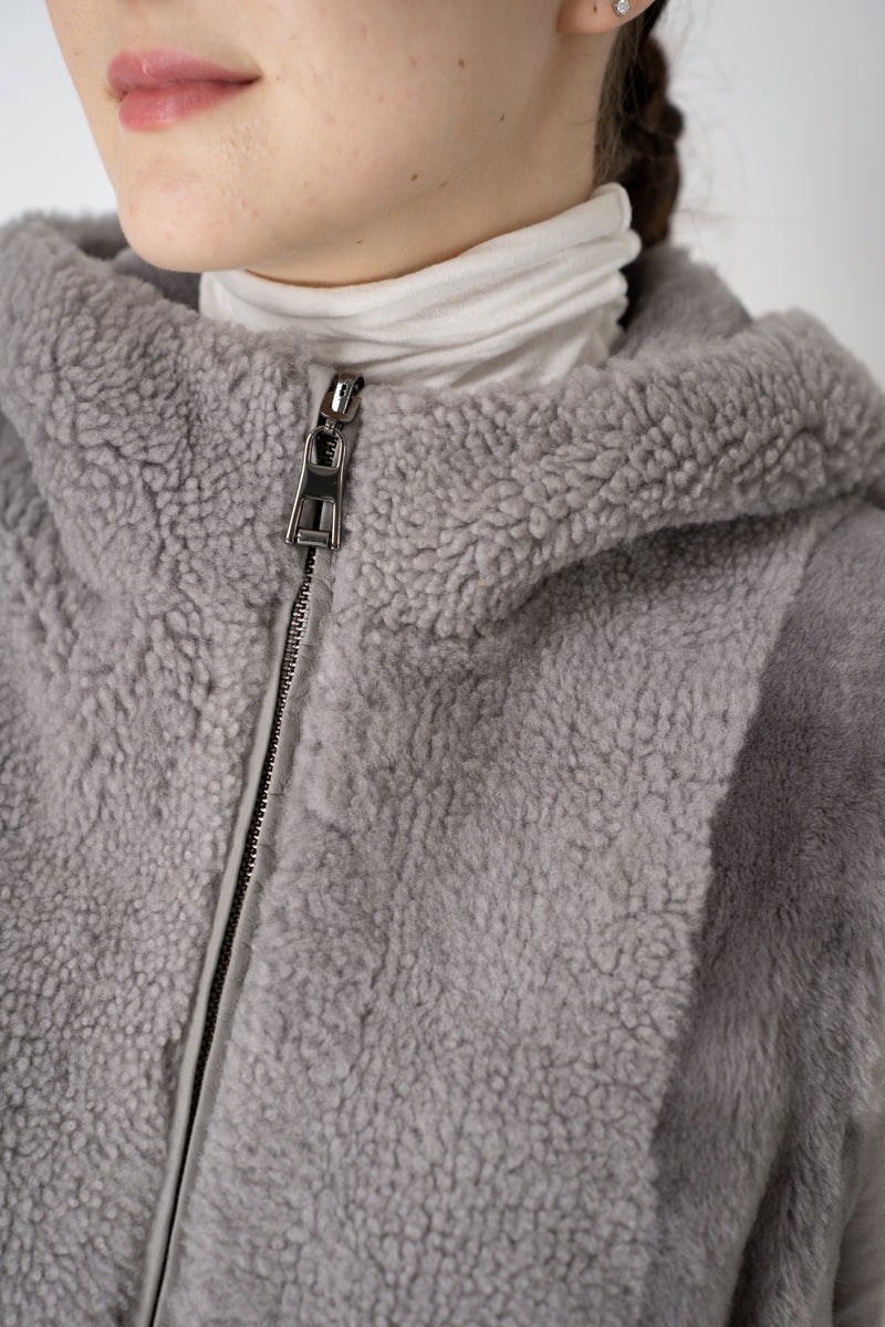 Rocco Ragni Reversible Hooded Textured Shearling Vest in Grey Vancouver. Shop Online or in Store.