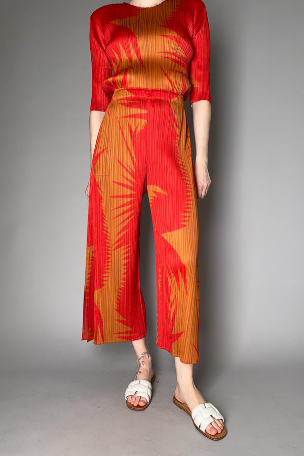 Pleats Please Issey Miyake Piquant Wide Leg Pants in Red and Orange Pattern Vancouver. Shop Online or in Store.