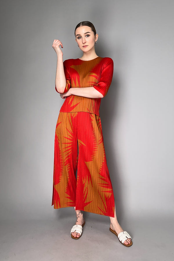 Pleats Please Issey Miyake Piquant Wide Leg Pants in Red and Orange Pattern Vancouver. Shop Online or in Store.