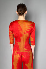 Pleats Please Issey Miyake Piquant 3/4 Sleeve Top in Red and Orange Pattern