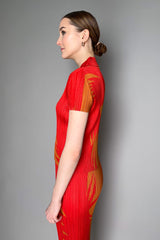 Pleats Please Issey Miyake Piquant Polo Shirt in Red and Orange Pattern