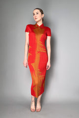 Pleats Please Issey Miyake Piquant Long Skirt in Red and Orange Pattern Vancouver. Shop Online or in Store.