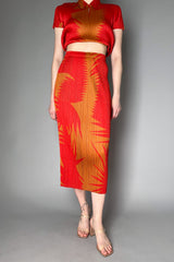 Pleats Please Issey Miyake Piquant Long Skirt in Red and Orange Pattern Vancouver. Shop Online or in Store.