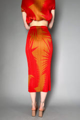 Pleats Please Issey Miyake Piquant Long Skirt in Red and Orange Pattern Vancouver. Shop Online or in Store.