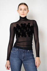 D. Exterior Stretch Tulle Turtleneck Top with Flock Chest Detail in Black