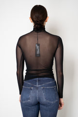 D. Exterior Stretch Tulle Turtleneck Top with Flock Chest Detail in Black