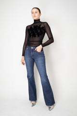 D. Exterior Stretch Tulle Turtleneck Top with Flock Chest Detail in Black