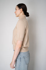 D. Exterior Knit Diamond Checkered Lurex Short Sleeve Turtleneck Sweater in Pink Nude Vancouver. Shop Online or in Store.