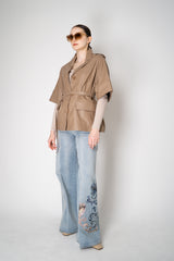 D. Exterior Virgin Wool Knit Ribbed V-neck Pullover in Nude Vancouver. Shop Online or in Store.