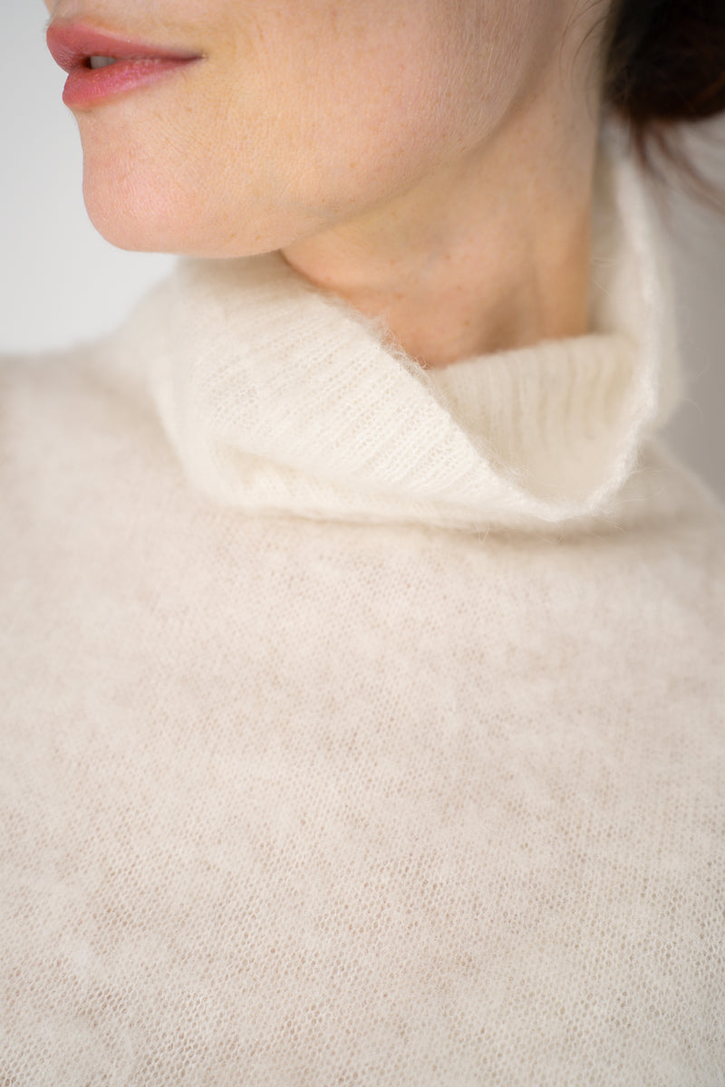 D. Exterior Wool Alpaca Soft Sleeveless Turtleneck Pullover Top in White Vancouver. Shop Online or in Store.