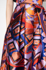 Lunatica Milano Satin Maxi Pleated Skirt in Orange and Violet Kaleidoscope Print