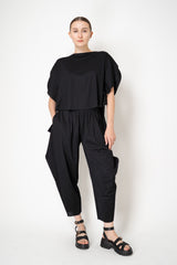 Pleats Please Issey Miyake A-Poc Slice Round Silhouette Top in Black