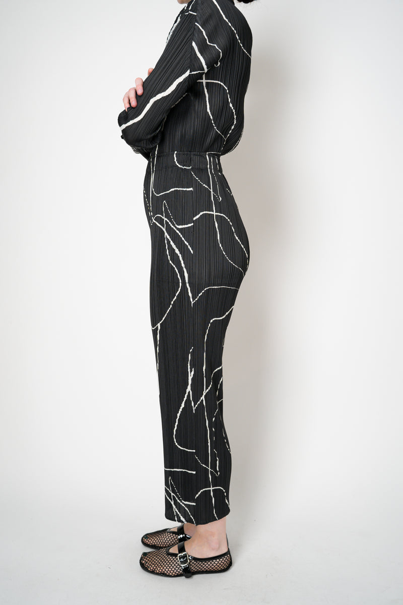 Pleats Please Issey Miyake Pause Contrasting Silhouettes Trousers in Black and White