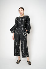 Pleats Please Issey Miyake Pause Contrasting Silhouettes Trousers in Black and White