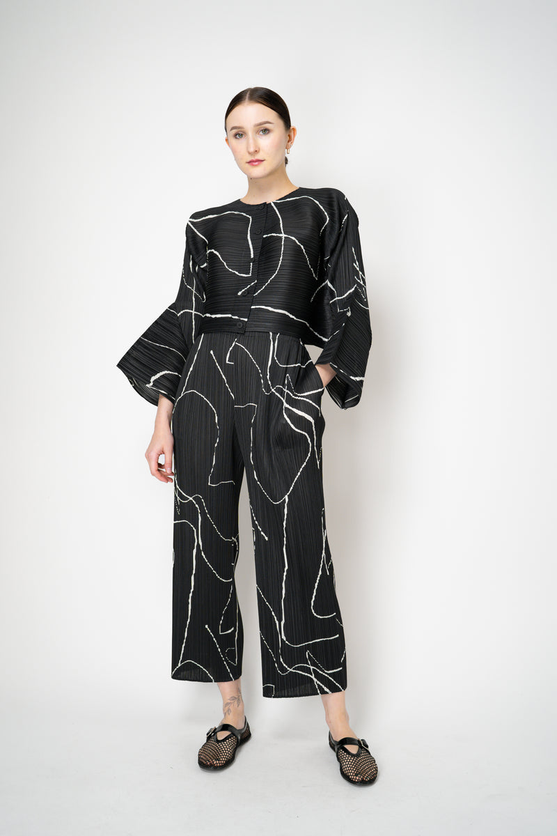 Pleats Please Issey Miyake Pause Contrasting Silhouettes Trousers in Black and White