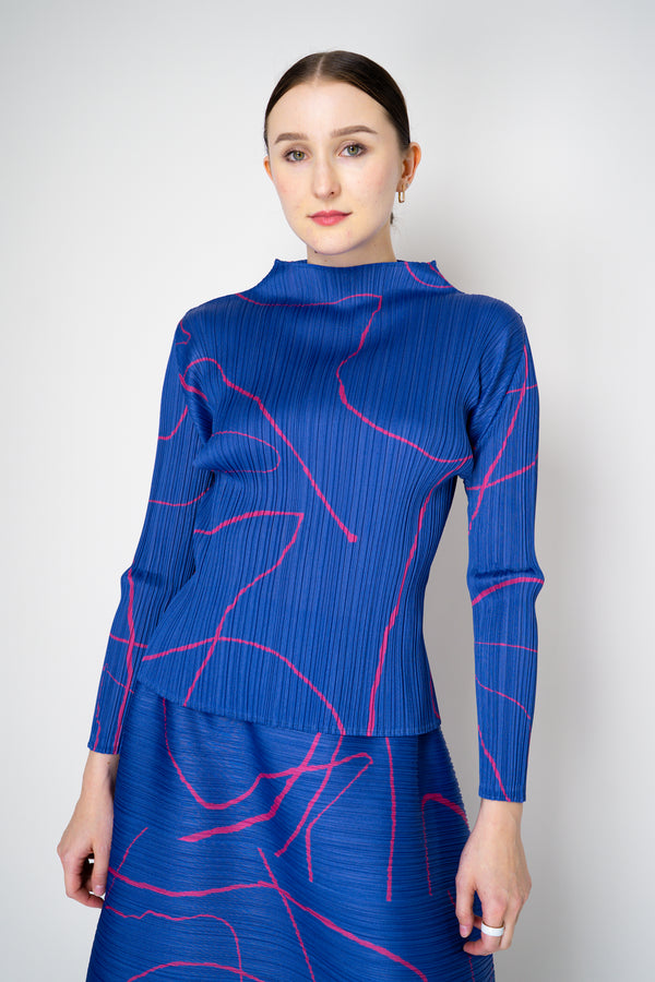 Pleats Please Issey Miyake Pause Contrasting Silhouettes High Neck Long Sleeve Top in Indigo and Pink Vancouver. Shop Online or in Store.