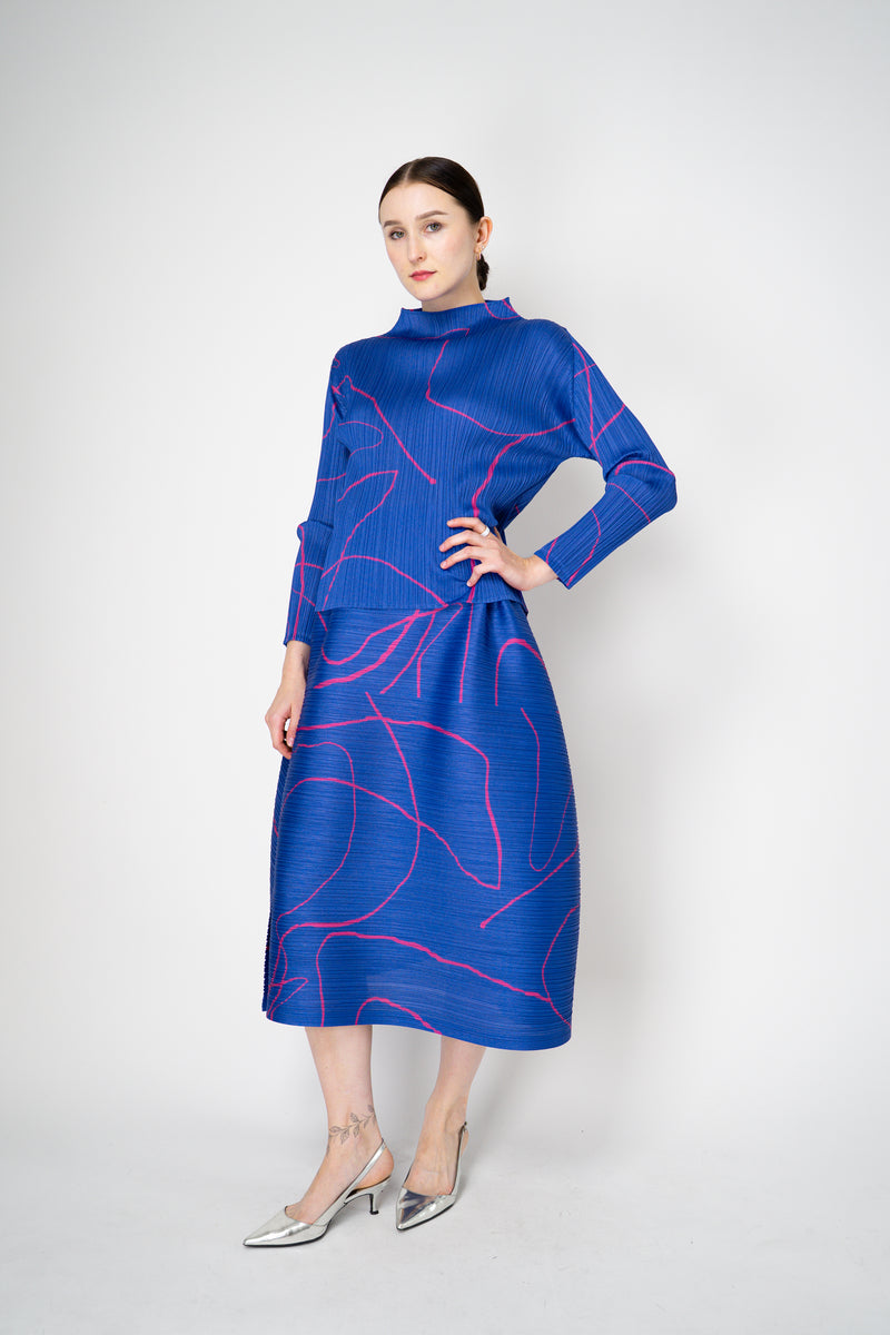 Pleats Please Issey Miyake Pause Contrasting Silhouettes High Neck Long Sleeve Top in Indigo and Pink Vancouver. Shop Online or in Store.