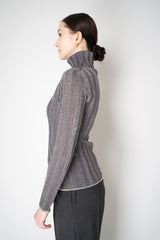 Fabiana Filippi Liquid Drape Ribbed Knit Turtleneck Pullover in Lurex Silver Vancouver. Shop Online or in Store.