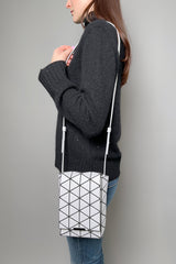 Bao Bao Issey Miyake Small Flap Shoulder Bag in Light Grey Matte Vancouver. Shop Online or in Store. 