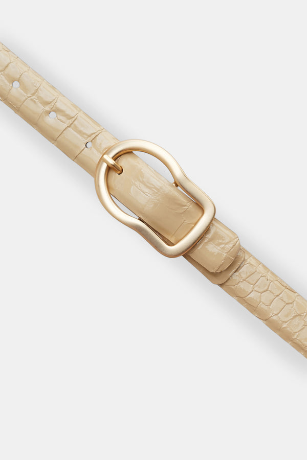 Dorothee Schumacher Reversible Belt with Signature Buckle in Shimmering Camel Vancouver. Shop Online or in Store. 
