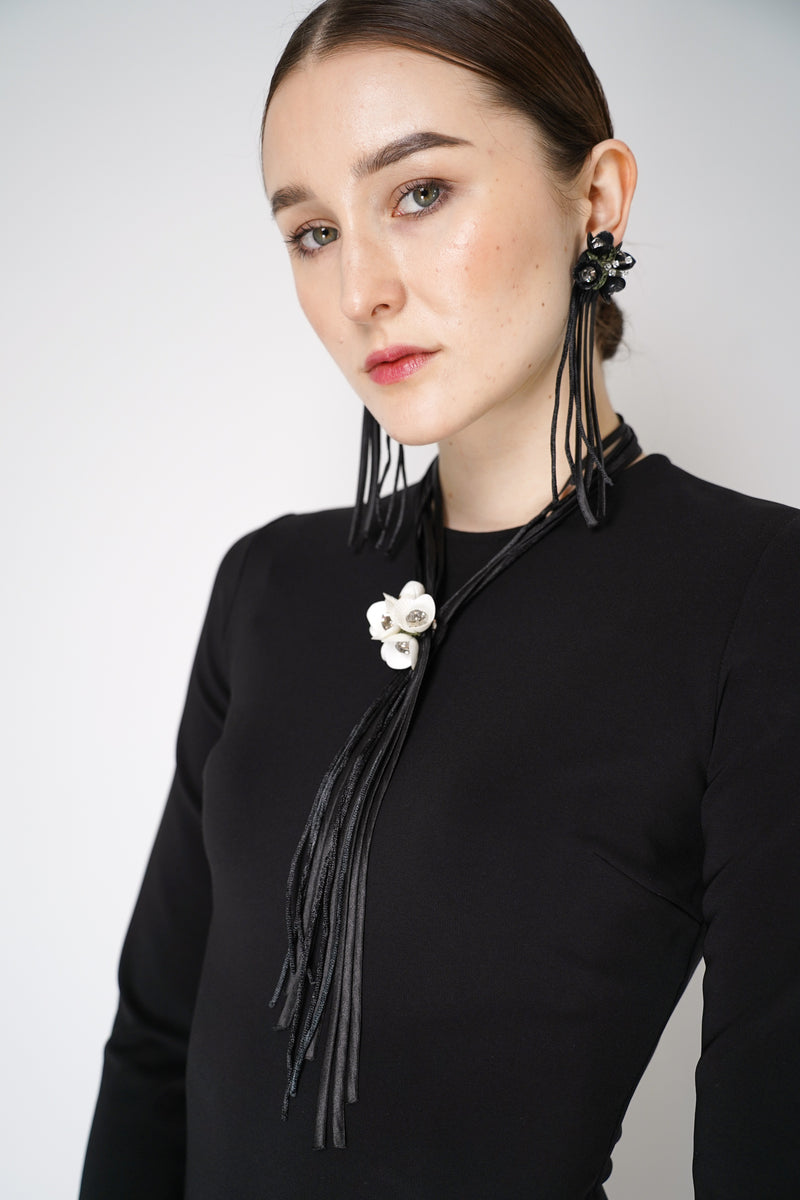 Dorothee Schumacher Dangling Flower Tassle Necklace in White Vancouver. Shop Online or in Store.