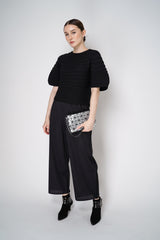 Pleats Please Issey Miyake Mushroom Knit Ribbed Top in Black Vancouver. Shop Online or in Store. 