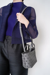 Bao Bao Issey Miyake Crystal Matte Mini Hand Bag in Grey Vancouver. Shop Online or in Store. 