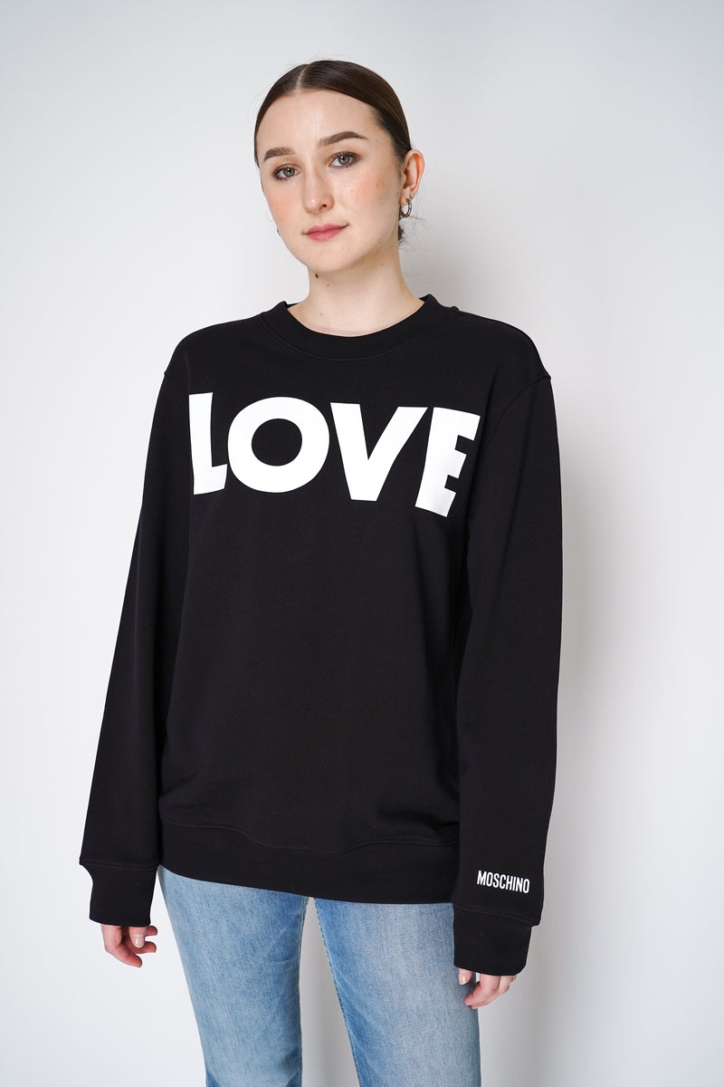 Moschino "LOVE" Organic Cotton Pullover in Black Vancouver. Shop Online or in Store. 