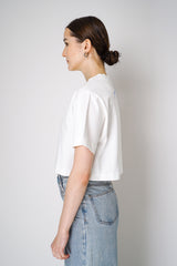Moschino Jeans Cropped "Twist" Jersey T-Shirt in White Vancouver. Shop Online or in Store. 