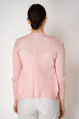 Pleats Please Issey Miyake Monthly Colors: March Cardigan in Pink Vancouver. Shop Online or in Store.