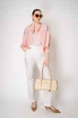Pleats Please Issey Miyake Monthly Colors: March Cardigan in Pink Vancouver. Shop Online or in Store.