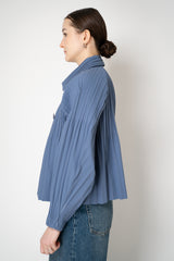 Pleats Please Issey Miyake Short Smooth Coat in Blue Grey Vancouver. Shop Online or in Store.