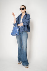 Pleats Please Issey Miyake Short Smooth Coat in Blue Grey Vancouver. Shop Online or in Store.