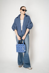 Pleats Please Issey Miyake Short Smooth Coat in Blue Grey Vancouver. Shop Online or in Store.