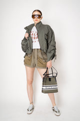 Balmain Small Bucket Bag in Canvas and Calfskin in Olive Green Vancouver. Shop Online or in Store.