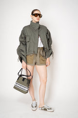 Balmain Small Bucket Bag in Canvas and Calfskin in Olive Green Vancouver. Shop Online or in Store.