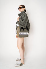 Balmain Small Bucket Bag in Canvas and Calfskin in Olive Green Vancouver. Shop Online or in Store.