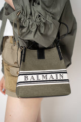 Balmain Small Bucket Bag in Canvas and Calfskin in Olive Green Vancouver. Shop Online or in Store.