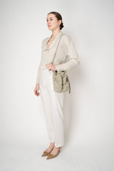Bao Bao Issey Miyake Wring Clay Small Bucket Bag in Sage Green