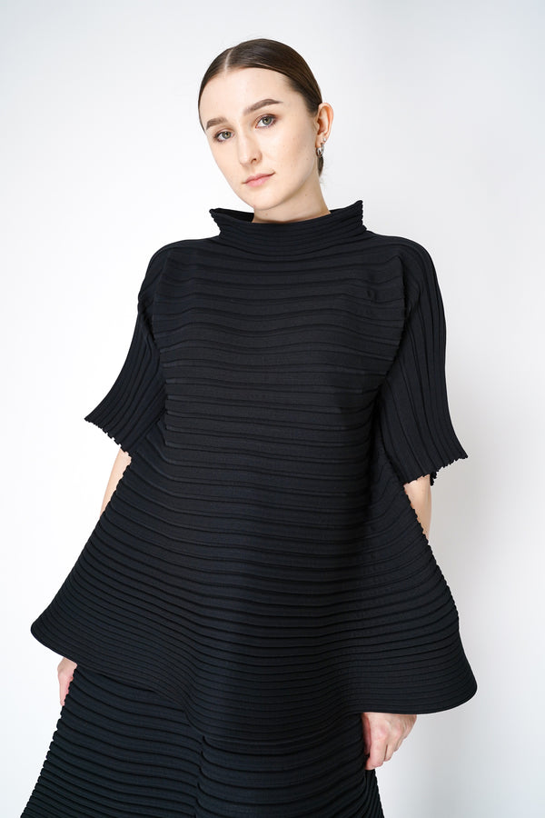 Pleats Please Issey Miyake Bounce Knit High Neck Flared Top in Black Vancouver. Shop Online or in Store.