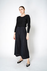 Pleats Please Issey Miyake Thicker Bottoms 2 Pants with Flared Calves in Black Vancouver. Shop Online or in Store. 