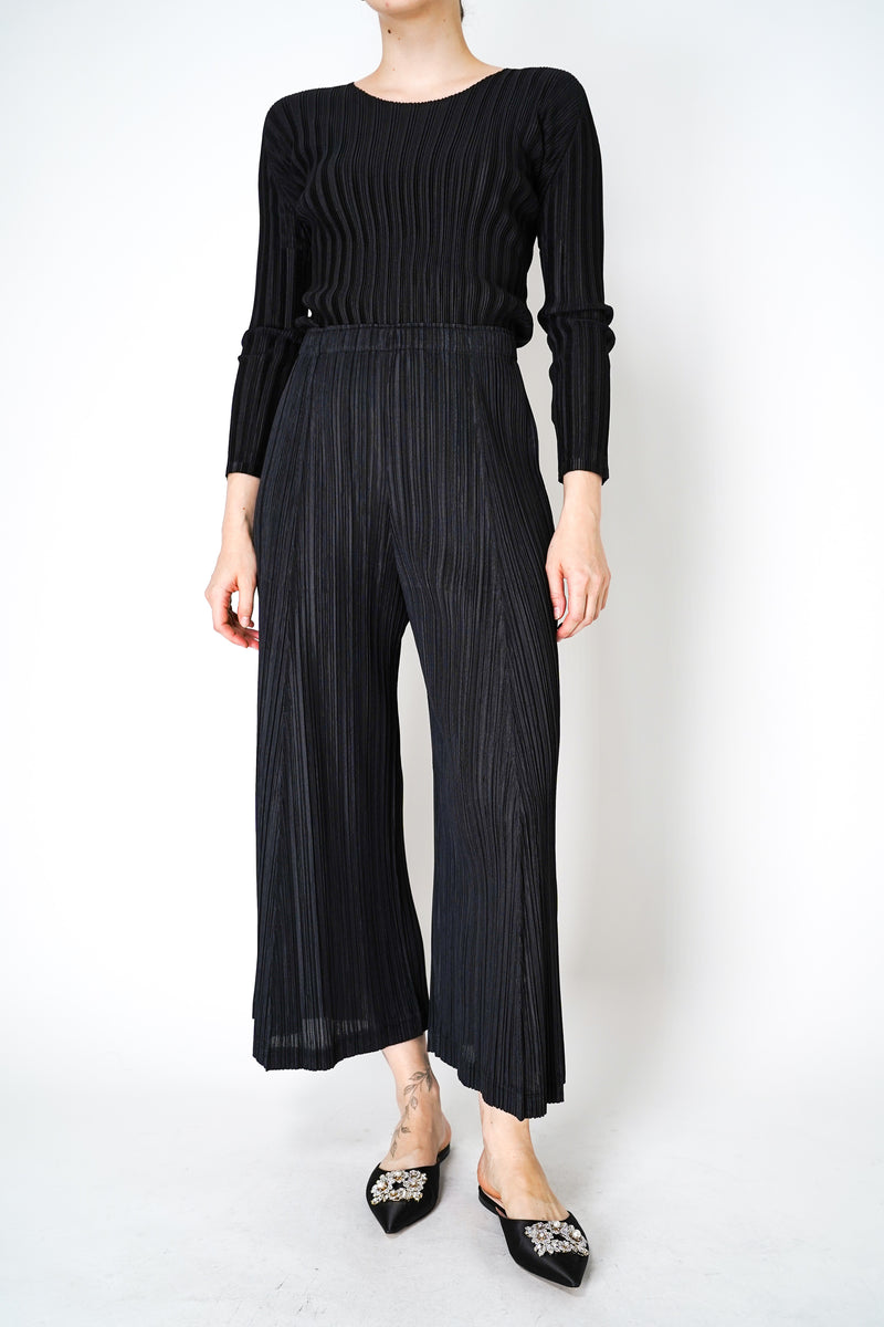 Pleats Please Issey Miyake Thicker Bottoms 2 Pants with Flared Calves in Black Vancouver. Shop Online or in Store. 