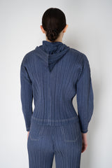 Pleats Please Issey Miyake Cotton Denim Cropped Zip Jacket in Medium Blue Wash