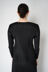 Pleats Please Issey Miyake Monthly Colors: October Round Hem Long Sleeve Top in Black